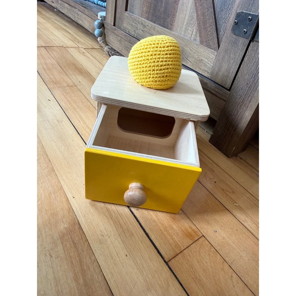 Monti Kids motor planning wooden yellow‎ box with drawer and yellow knit ball
